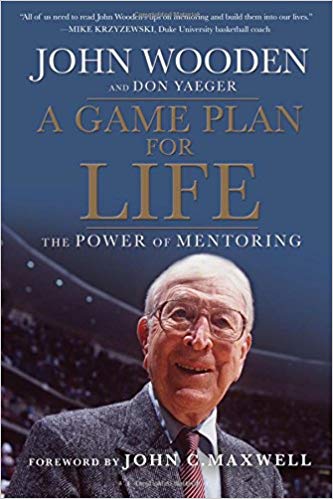 The book cover for A Game Plan for Life: The Power of Mentoring by John Wooden